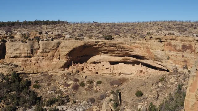 Mesa landscape and cliff dwelling context